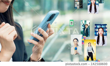 Image of a woman using a smartphone in the city and vertical video content Image of a woman using a smartphone in the city and vertical video content 142588600