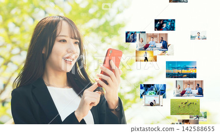 城市中使用智慧型手機的女性與影片內容 城市中使用智慧型手機的女性與影片內容 142588655