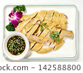```The delicately plated white cut chicken served with dipping sauce``` 142588800