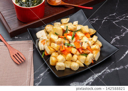 stir Fried Chinese Steamed Bread Cubes with Vegetables, Traditional Shaanxi Snack 142588821