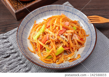 chinese Stir-Fried Shredded Pancake Noodles with Sliced Ham, Savory Asian Street Food chinese Stir-Fried Shredded Pancake Noodles with Sliced Ham, Savory Asian Street Food 142588833