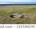 Image of cleaning up after a campsite 142589295