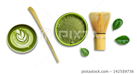 Matcha. Matcha powder, bamboo whisk, and green tea blend create a serene setting 142589736
