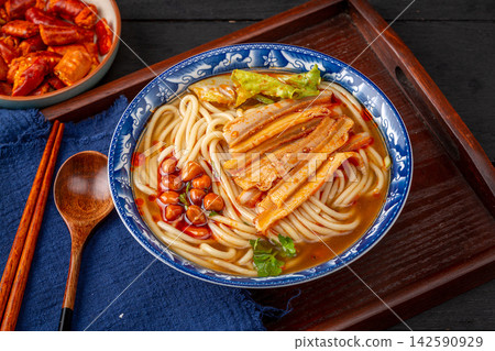 chinese Hot and Spicy Rice Noodle Soup with Shredded Beef Tripe, Traditional Hunan Mifen Bowl chinese Hot and Spicy Rice Noodle Soup with Shredded Beef Tripe, Traditional Hunan Mifen Bowl 142590929