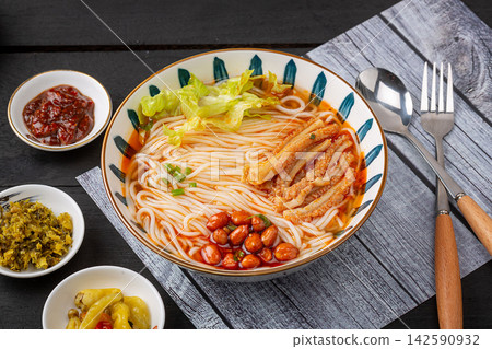 chinese Hot and Spicy Rice Noodles with Mixed Beef Offal, Traditional Yunnan Mixian Noodle Soup chinese Hot and Spicy Rice Noodles with Mixed Beef Offal, Traditional Yunnan Mixian Noodle Soup 142590932