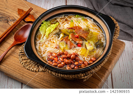 chinese Rice Noodles with Pickled Mustard Greens and Sliced Pork, Spicy Mixian in Clay Pot chinese Rice Noodles with Pickled Mustard Greens and Sliced Pork, Spicy Mixian in Clay Pot 142590935