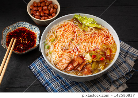 chinese Rice Noodles with Pickled Mustard Greens and Sliced Pork, Spicy Mixian in Clay Pot chinese Rice Noodles with Pickled Mustard Greens and Sliced Pork, Spicy Mixian in Clay Pot 142590937