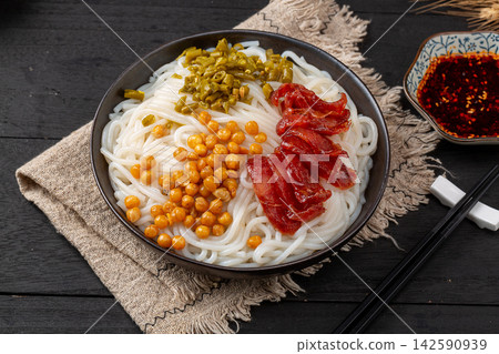 chinese Dry Mix Noodles with Sliced Chinese Sausage, Traditional Guilin Style Rice Noodles Bowl chinese Dry Mix Noodles with Sliced Chinese Sausage, Traditional Guilin Style Rice Noodles Bowl 142590939