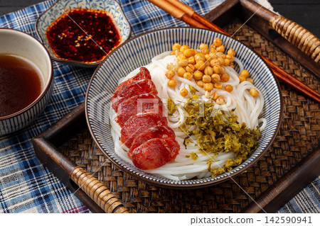 chinese Dry Mix Noodles with Sliced Chinese Sausage, Traditional Guilin Style Rice Noodles Bowl chinese Dry Mix Noodles with Sliced Chinese Sausage, Traditional Guilin Style Rice Noodles Bowl 142590941