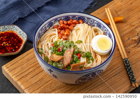 chinese Rice Noodle Soup with Stir-Fried Pork and Green Chili, Spicy Yunnan Mixian Bowl chinese Rice Noodle Soup with Stir-Fried Pork and Green Chili, Spicy Yunnan Mixian Bowl 142590950