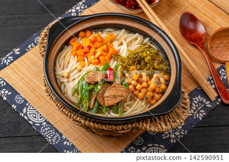 chinese Rice Noodle Soup with Stir-Fried Pork and Green Chili, Spicy Yunnan Mixian Bowl chinese Rice Noodle Soup with Stir-Fried Pork and Green Chili, Spicy Yunnan Mixian Bowl 142590951