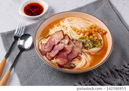chinese Rice Noodle Soup with Sliced Cured Pork Belly, Spicy Yunnan Mixian Noodle Bowl chinese Rice Noodle Soup with Sliced Cured Pork Belly, Spicy Yunnan Mixian Noodle Bowl 142590953
