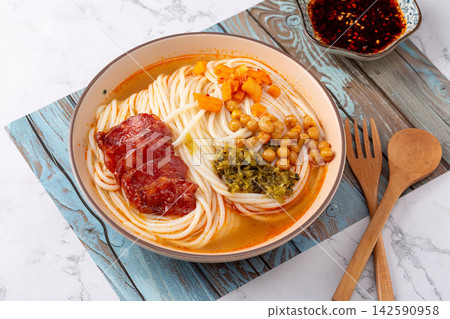spicy Chinese Rice Noodle Soup with Sliced Sweet Chinese Sausage, Traditional Mifen Noodle Bowl spicy Chinese Rice Noodle Soup with Sliced Sweet Chinese Sausage, Traditional Mifen Noodle Bowl 142590958