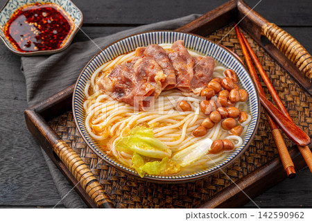 chinese Rice Noodles with Fatty Beef Slices in Golden Sour and Spicy Broth, Yunnan Mixian Bowl chinese Rice Noodles with Fatty Beef Slices in Golden Sour and Spicy Broth, Yunnan Mixian Bowl 142590962