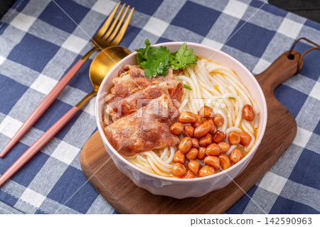chinese Rice Noodles with Fatty Beef Slices in Golden Sour and Spicy Broth, Yunnan Mixian Bowl chinese Rice Noodles with Fatty Beef Slices in Golden Sour and Spicy Broth, Yunnan Mixian Bowl 142590963