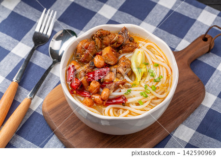 chinese Spicy Rice Noodles with Sichuan Laziji Spicy Chicken, Yunnan Mixian Noodle Bowl chinese Spicy Rice Noodles with Sichuan Laziji Spicy Chicken, Yunnan Mixian Noodle Bowl 142590969