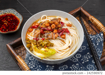 chinese Spicy Rice Noodles with Sichuan Laziji Spicy Chicken, Yunnan Mixian Noodle Bowl chinese Spicy Rice Noodles with Sichuan Laziji Spicy Chicken, Yunnan Mixian Noodle Bowl 142590972