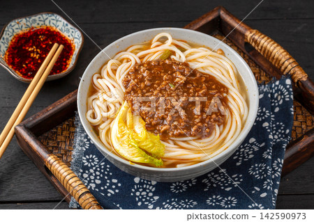 chinese Rice Noodles with Savory Minced Pork Sauce, Traditional Yunnan Zajiang Mixian Bowl chinese Rice Noodles with Savory Minced Pork Sauce, Traditional Yunnan Zajiang Mixian Bowl 142590973