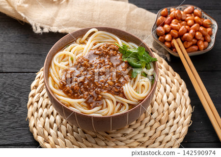 chinese Rice Noodles with Savory Minced Pork Sauce, Traditional Yunnan Zajiang Mixian Bowl chinese Rice Noodles with Savory Minced Pork Sauce, Traditional Yunnan Zajiang Mixian Bowl 142590974