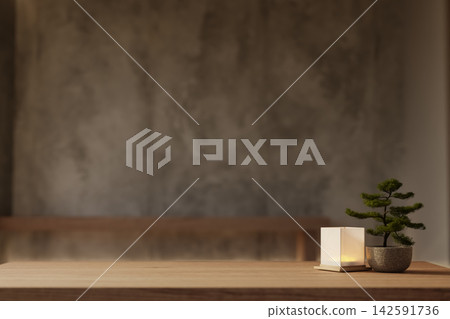 Close up of a wooden table with potted bonsai plant and decorative cube lamp in a loft wall room. Close up of a wooden table with potted bonsai plant and decorative cube lamp in a loft wall room. 142591736