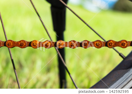 Rusted bicycle chain Rusted bicycle chain 142592595