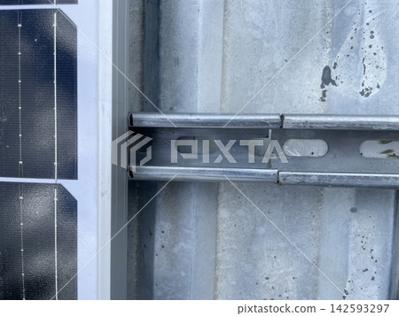 Installing two solar panels on roof Installing two solar panels on roof 142593297