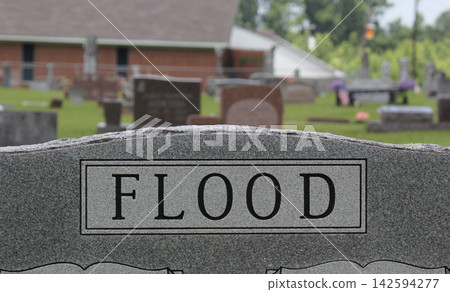 Headstone in Cemetery With Word Flood Headstone in Cemetery With Word Flood 142594277