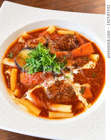 Beef and vegetable tomato stew pasta Beef and vegetable tomato stew pasta 142595342