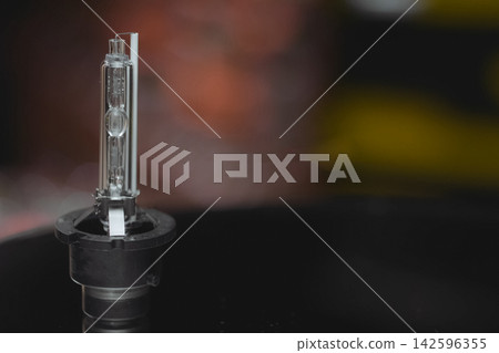 Xenon lamp on the table. appearance of a xenon lamp. Xenon lamp on the table. appearance of a xenon lamp. 142596355