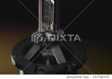 Xenon lamp on the table. appearance of a xenon lamp. Xenon lamp on the table. appearance of a xenon lamp. 142596356