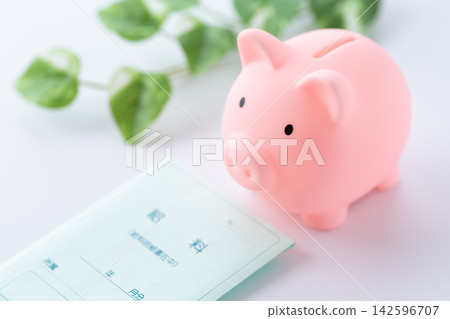 Pink pig piggy bank and salary Pink pig piggy bank and salary 142596707