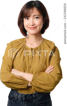 Asian woman smiling with crossed arms in mustard blouse and jeans on transparent background for professional portrait use Asian woman smiling with crossed arms in mustard blouse and jeans on transparent background for professional portrait use 142598859