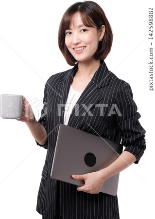 Asian woman smiling in formal clothing holding laptop and ceramic cup against transparent background Asian woman smiling in formal clothing holding laptop and ceramic cup against transparent background 142598882