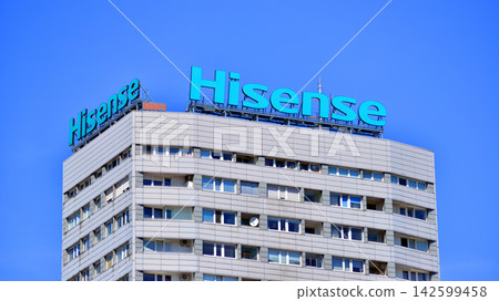 Warsaw, Poland. 15 August 2026. Urban landscape. Neon sign with the inscription: Hisense Warsaw, Poland. 15 August 2026. Urban landscape. Neon sign with the inscription: Hisense 142599458