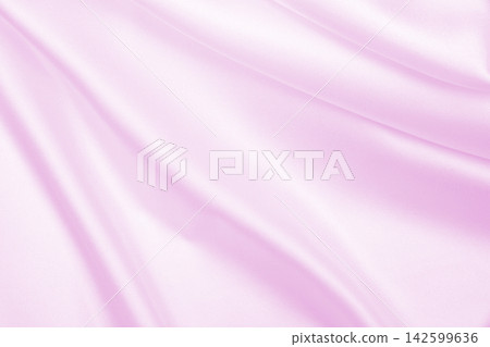 Smooth elegant pink silk or satin texture as wedding background. Luxurious background design Smooth elegant pink silk or satin texture as wedding background. Luxurious background design 142599636