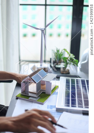 Architect Planning a Modern Solar Power House. 142599958