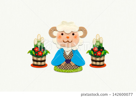 New Year's card with appliqué of a blue sheep in traditional Japanese clothing and a kadomatsu (New Year's pine decoration) / 2027, no text, horizontal format New Year's card with appliqué of a blue sheep in traditional Japanese clothing and a kadomatsu (New Year's pine decoration) / 2027, no text, horizontal format 142600077