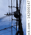 Utility poles and blue sky 142600147