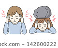 A woman holding her head with a headache 142600222