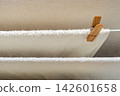 White Towels Air Drying Outdoors on a Clothesline 142601658