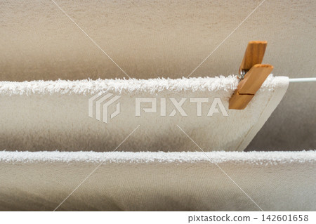 White Towels Air Drying Outdoors on a Clothesline White Towels Air Drying Outdoors on a Clothesline 142601658