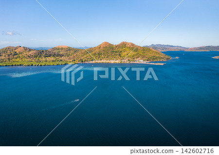 The blue sea and islands of Coron Bay 142602716