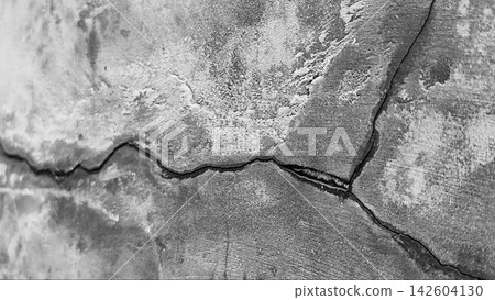 Monochrome Close-Up of Cracked Concrete Surface Monochrome Close-Up of Cracked Concrete Surface 142604130
