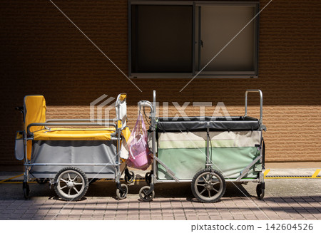 A stroller (evacuation vehicle) parked in front of the nursery school. A stroller (evacuation vehicle) parked in front of the nursery school. 142604526
