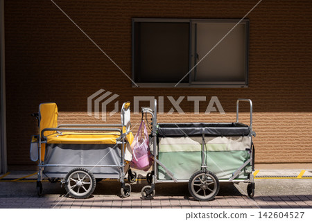 A stroller (evacuation vehicle) parked in front of the nursery school. A stroller (evacuation vehicle) parked in front of the nursery school. 142604527