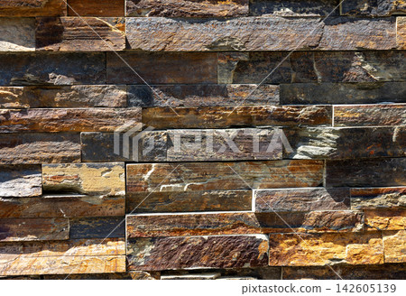Stylish stone-like tiles with a mix of brown and rust colors. Stylish stone-like tiles with a mix of brown and rust colors. 142605139