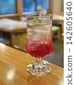 Vibrant pink red shiso juice 142605640