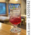 Vibrant pink red shiso juice 142605642