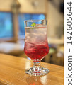 Vibrant pink red shiso juice 142605644