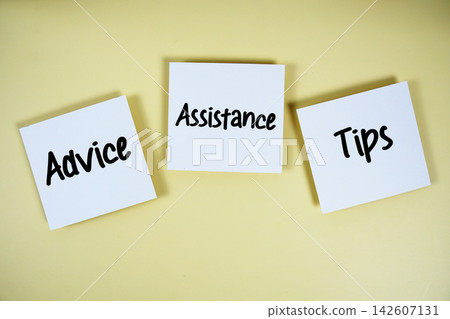Advice, Assistance, Tips message on paper note flat lay on yellow background 142607131
